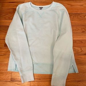 Cropped mint green sweatshirt